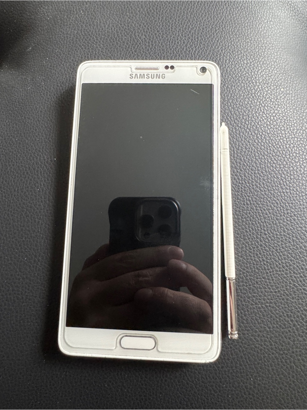 Samsung Galaxy Note 4 AT&T Unlocked 32GB includes stylus.